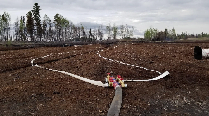 Use of high-volume water delivery systems in peat fires Central Alberta
