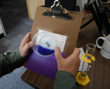 Visual assessment method of measuring cup amounts in airtanker drops